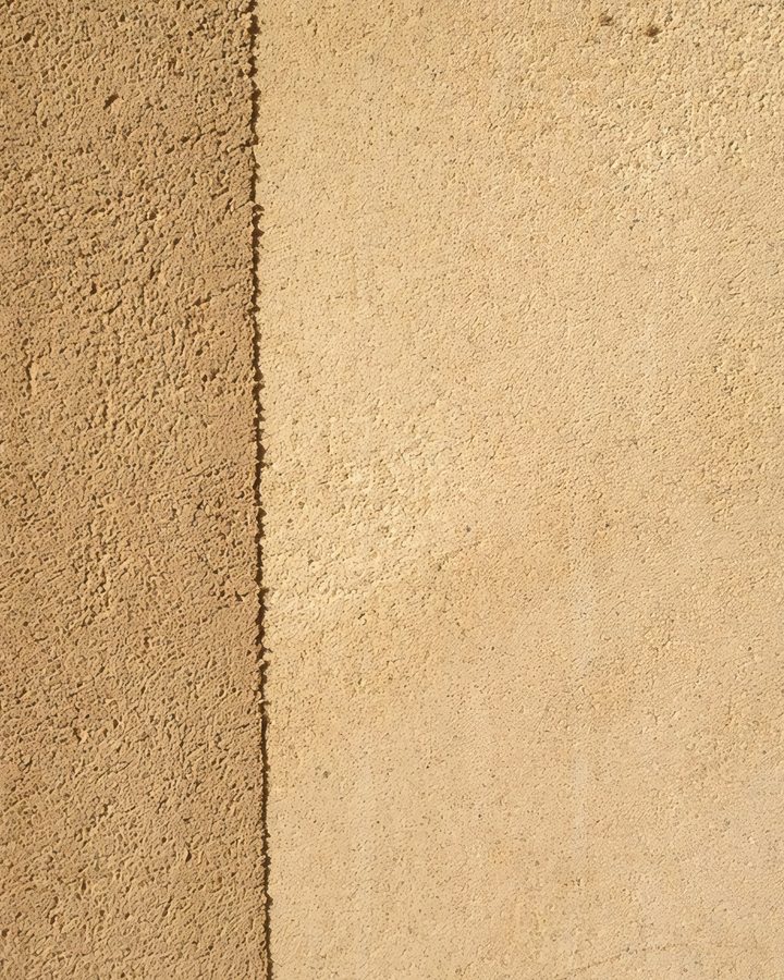 A tan surface, rough beside smooth.