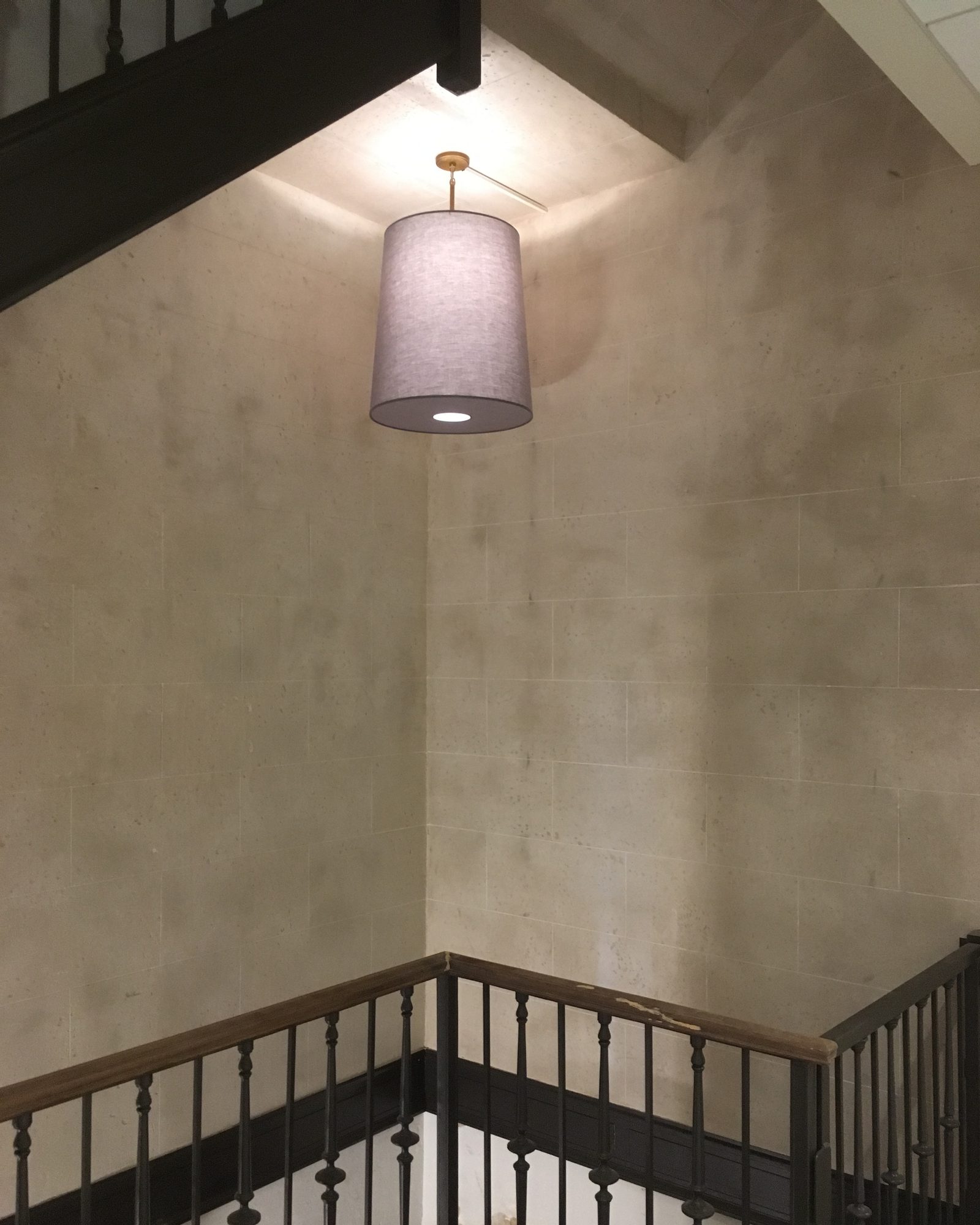 A stair hall finished in Lime Plaster Medium.