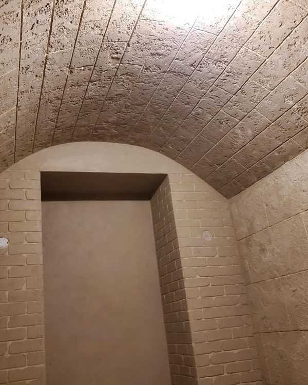 A barrel-vaulted wine cellar in Stonecoat.