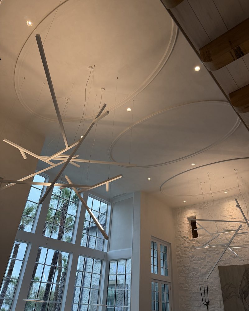 A double-height room finished in Lime Plaster Fine.