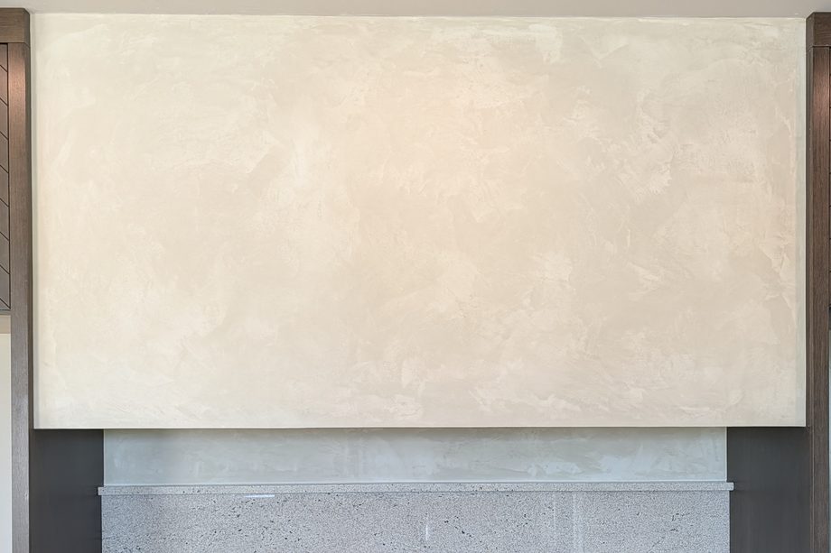 A range hood in coated stone.