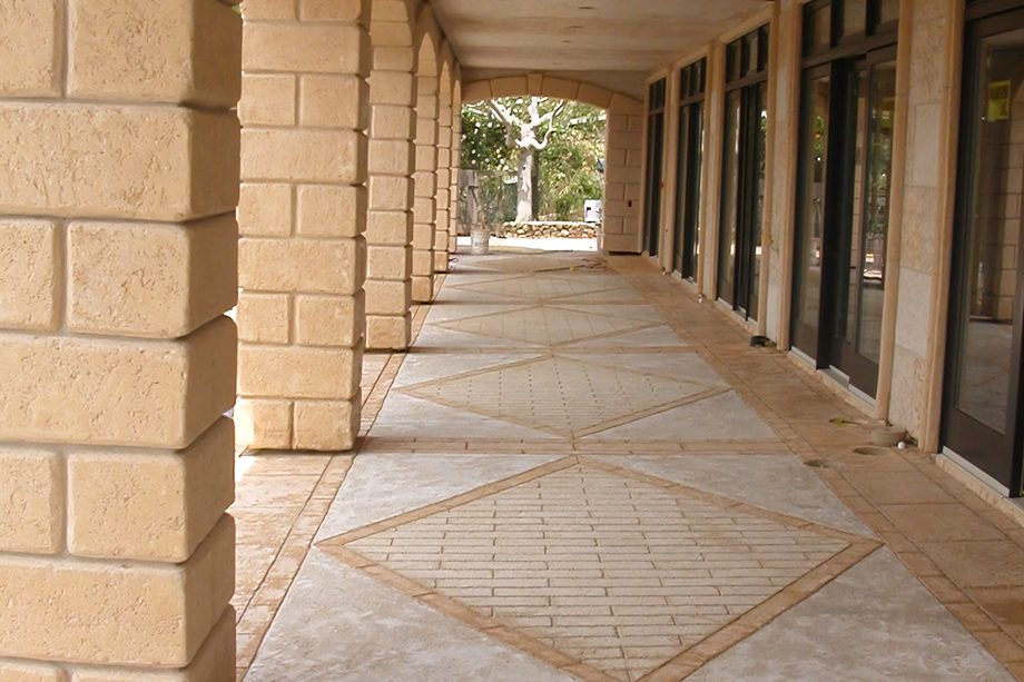Carved columns in coated stone.